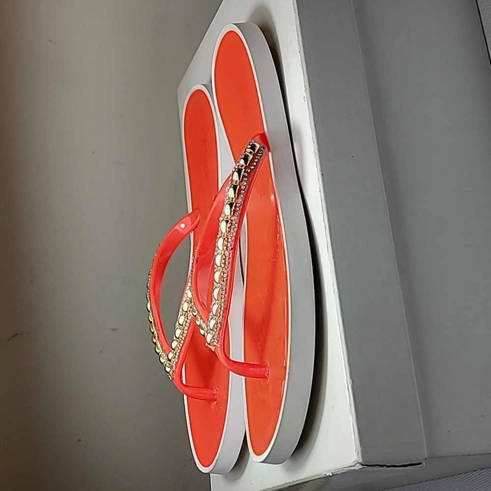 Magic Collection orange and white studded flip flops size 11
